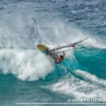 Hitting the lip on a Sunday swell.